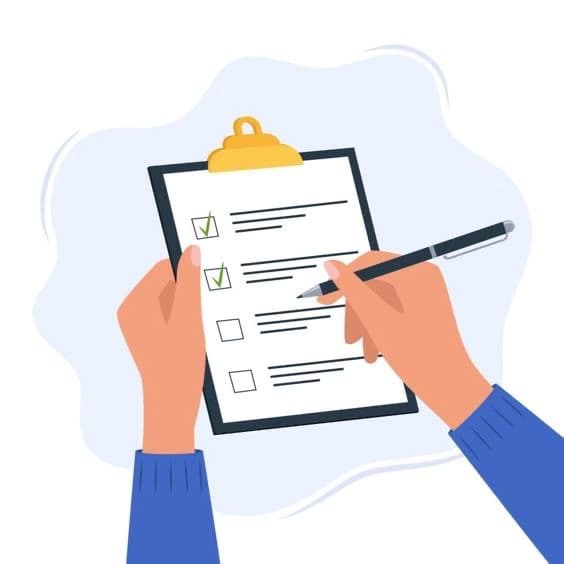 Hands completing a checklist representing psychological evaluation